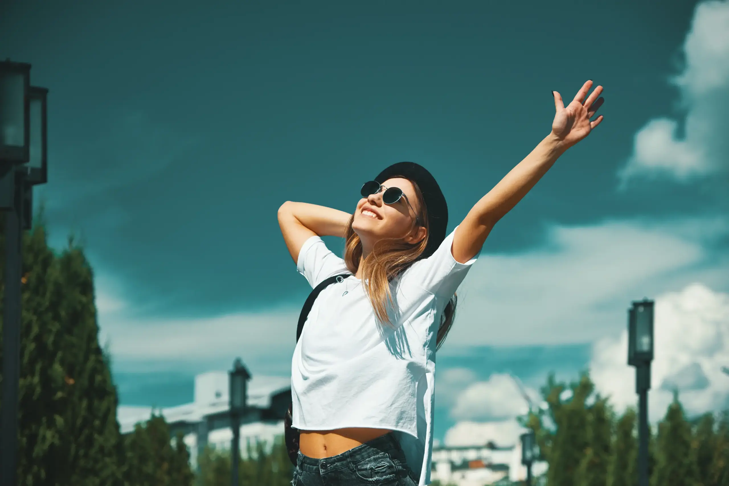 happy-young-woman-enjoying-vacation